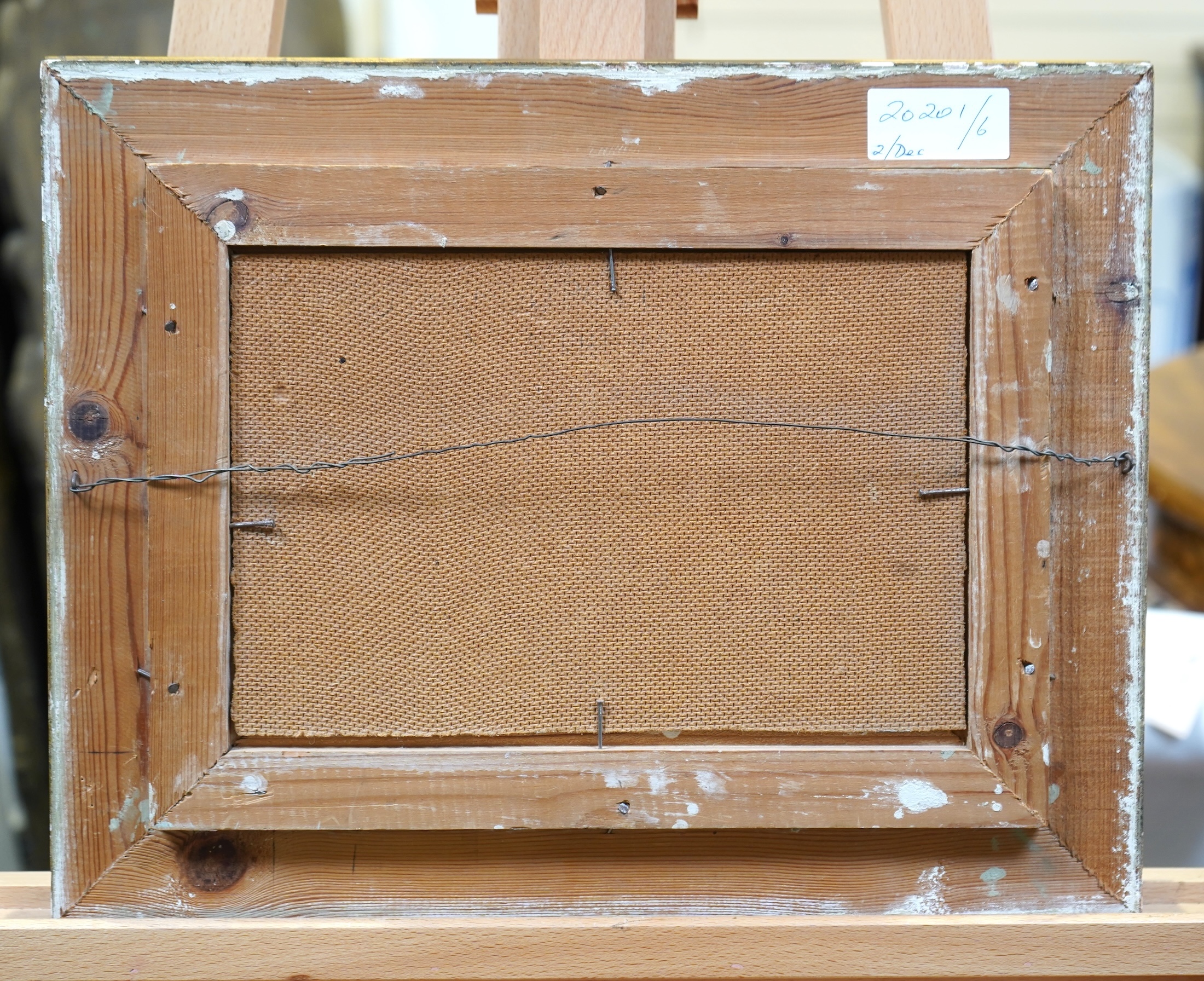 Georgios Kosmadopoulos, Greek 1895-1967, A Greek coastal scene with a figure relaxing to the foreground